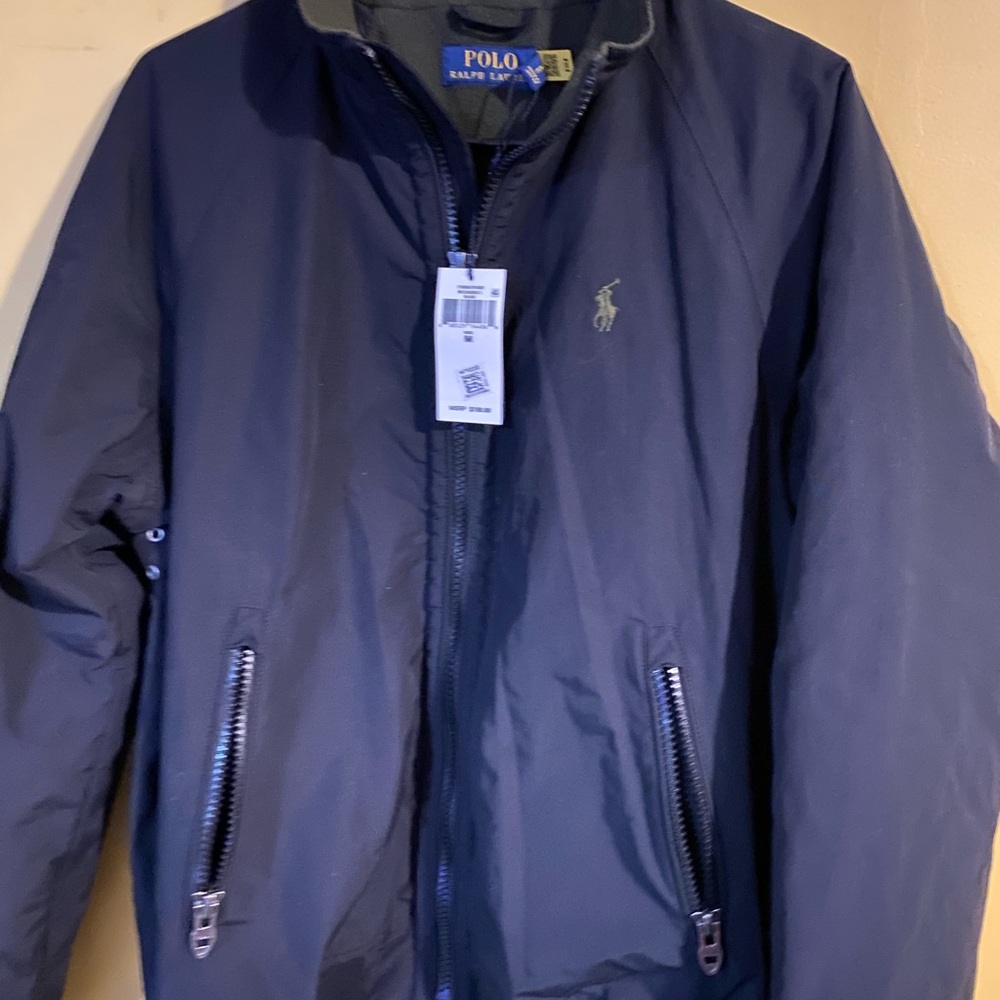 A brand new with tags never worn Polo Ralph Lauren light spring jacket size M